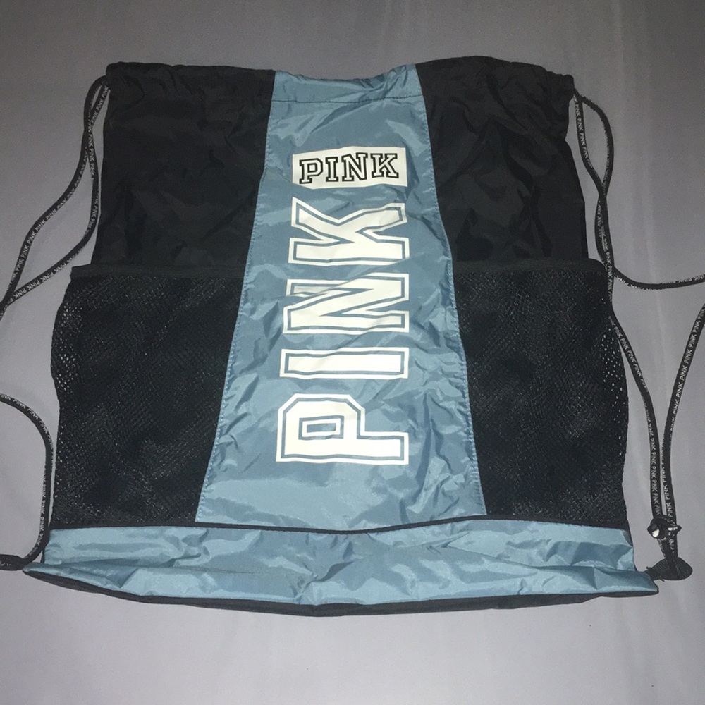 PINK string back pack in blue